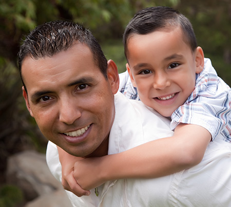 father with his child on his back